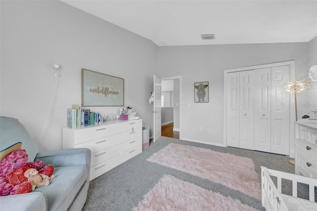 13122 Prestwick Dr, Riverview, FL 33579 - carpeted bedroom featuring a closet, visible vents, baseboards, and vaulted ceiling