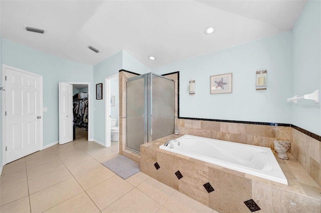 13122 Prestwick Dr, Riverview, FL 33579 - bathroom with tile patterned flooring, a shower stall, a walk in closet, visible vents, and a bath