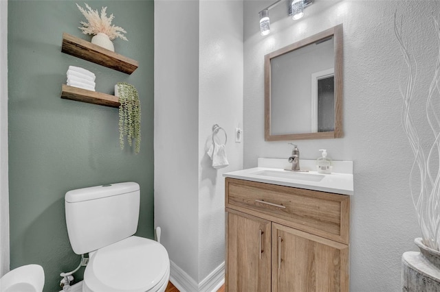 13122 Prestwick Dr, Riverview, FL 33579 - half bathroom with toilet, vanity, and baseboards