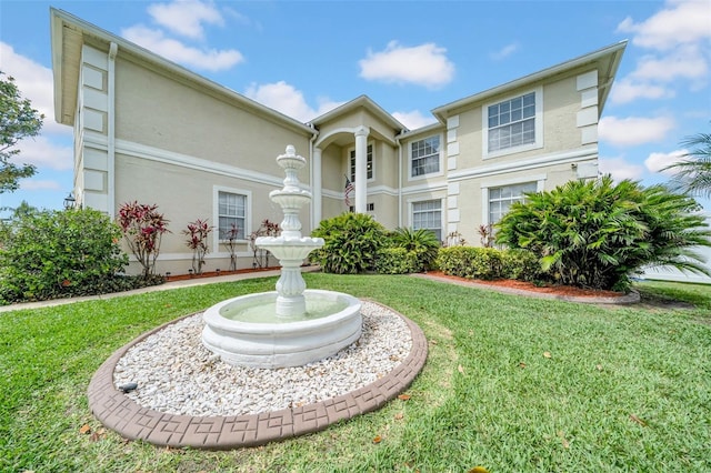 13122 Prestwick Dr, Riverview, FL 33579 - exterior space with stucco siding and a front yard
