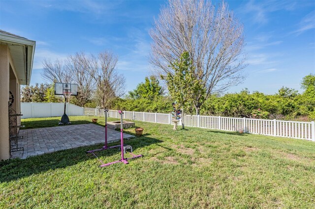 8247 Westhaven Dr, Land O Lakes, FL 34638 - view of yard featuring a patio