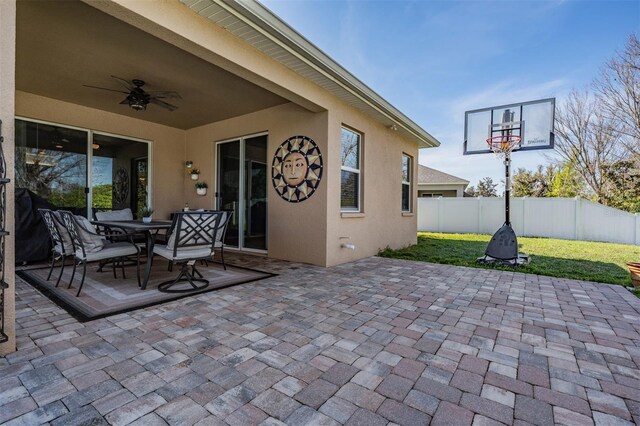 8247 Westhaven Dr, Land O Lakes, FL 34638 - view of patio / terrace featuring ceiling fan and outdoor dining area
