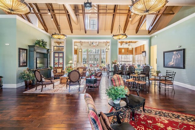8247 Westhaven Dr, Land O Lakes, FL 34638 - living area featuring baseboards, wood-type flooring, wood ceiling with exposed beams, and high vaulted ceiling