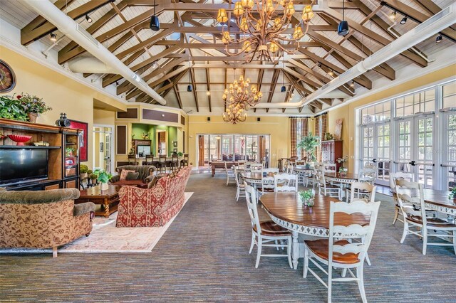 8247 Westhaven Dr, Land O Lakes, FL 34638 - dining room featuring a chandelier, high vaulted ceiling, french doors, carpet, and beamed ceiling