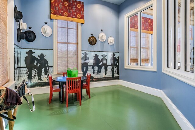 8247 Westhaven Dr, Land O Lakes, FL 34638 - dining room featuring concrete floors