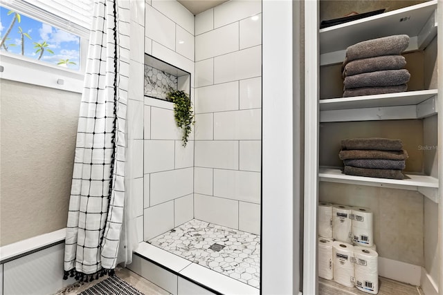 full bathroom featuring a stall shower