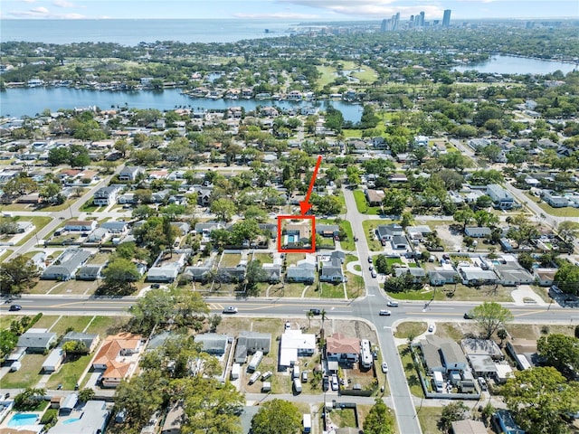 birds eye view of property featuring a water view