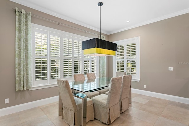 47 Martinique Ave, Tampa, FL 33606 - dining room featuring baseboards, light tile patterned floors, and crown molding