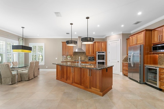 47 Martinique Ave, Tampa, FL 33606 - kitchen featuring decorative backsplash, beverage cooler, appliances with stainless steel finishes, brown cabinetry, and wall chimney exhaust hood