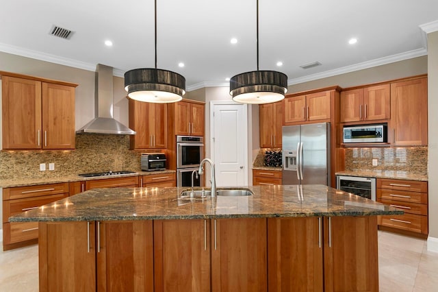 47 Martinique Ave, Tampa, FL 33606 - kitchen featuring a sink, wall chimney exhaust hood, brown cabinetry, stainless steel appliances, and visible vents
