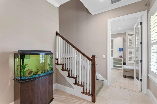 47 Martinique Ave, Tampa, FL 33606 - stairs featuring baseboards, ornamental molding, and tile patterned floors