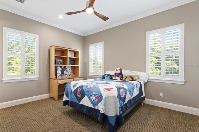 47 Martinique Ave, Tampa, FL 33606 - bedroom featuring light carpet, baseboards, and multiple windows