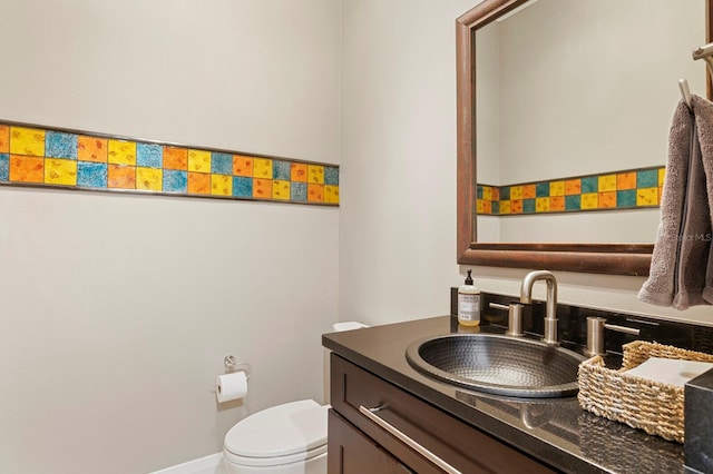 47 Martinique Ave, Tampa, FL 33606 - bathroom with baseboards, toilet, and vanity