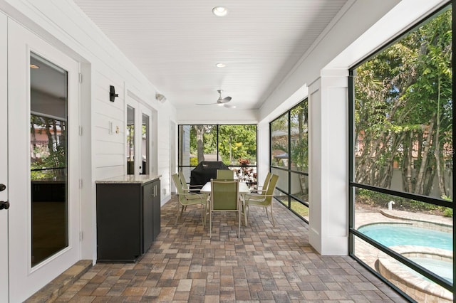 47 Martinique Ave, Tampa, FL 33606 - sunroom / solarium with brick floor, a jacuzzi, and recessed lighting