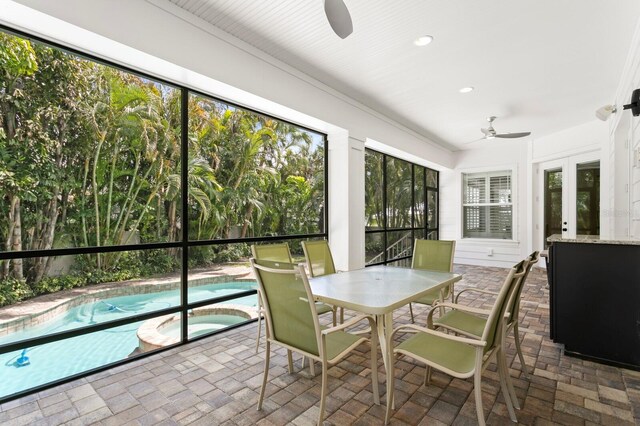 47 Martinique Ave, Tampa, FL 33606 - sunroom / solarium featuring french doors, a hot tub, and a wealth of natural light