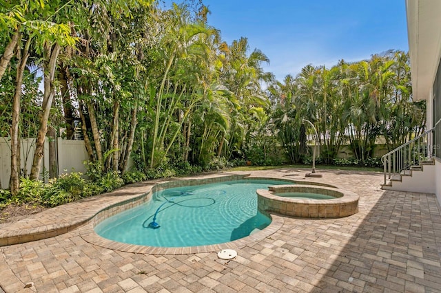 47 Martinique Ave, Tampa, FL 33606 - view of pool with a pool with connected hot tub, fence, and a patio area