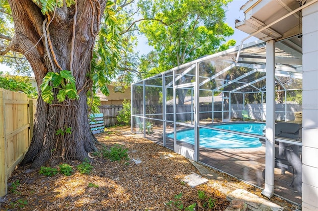 8766 91st St, Seminole, FL 33777 - view of pool featuring a fenced backyard, a lanai, and a fenced in pool