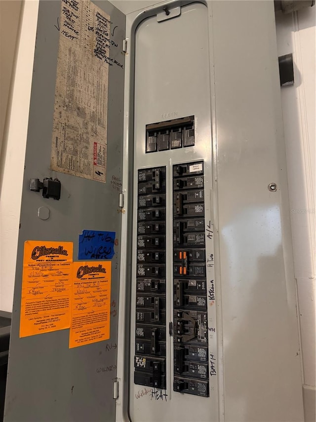 8766 91st St, Seminole, FL 33777 - utility room featuring electric panel