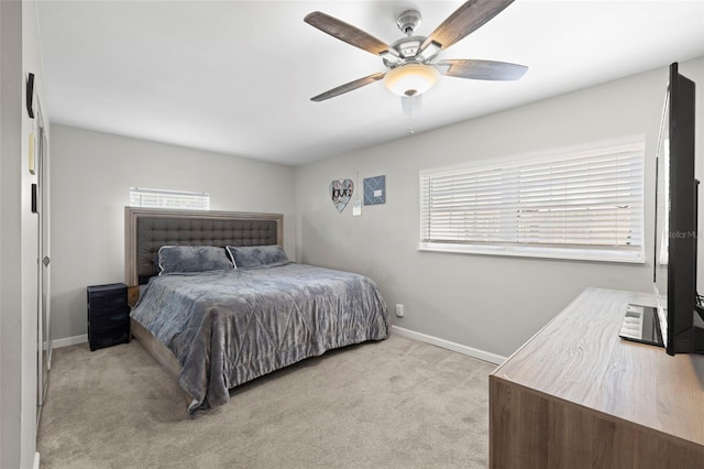 8766 91st St, Seminole, FL 33777 - bedroom featuring light carpet, baseboards, and multiple windows