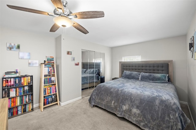 8766 91st St, Seminole, FL 33777 - carpeted bedroom with a closet, a ceiling fan, and baseboards