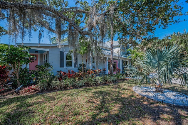 view of front facade with a front yard