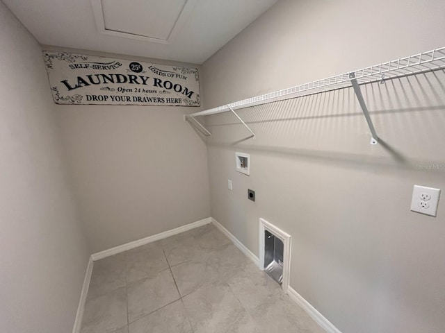 washroom featuring electric dryer hookup, baseboards, laundry area, and hookup for a washing machine