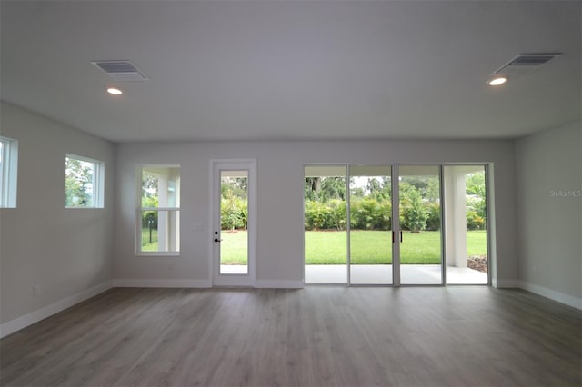 11884 Richmond Trl, Parrish, FL 34219 - unfurnished room featuring wood finished floors and recessed lighting