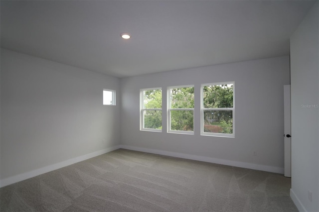 11884 Richmond Trl, Parrish, FL 34219 - carpeted empty room featuring baseboards and recessed lighting