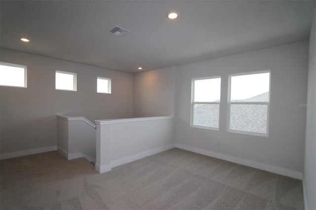 11884 Richmond Trl, Parrish, FL 34219 - empty room with light carpet and recessed lighting