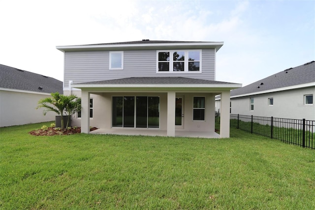 11884 Richmond Trl, Parrish, FL 34219 - rear view of house with a patio area, roof with shingles, and stucco siding