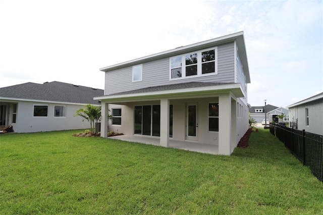 11884 Richmond Trl, Parrish, FL 34219 - back of property featuring a patio and a shingled roof