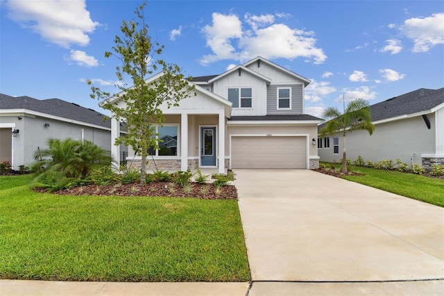 11884 Richmond Trl, Parrish, FL 34219 - craftsman house featuring board and batten siding, stone siding, a garage, and a front yard