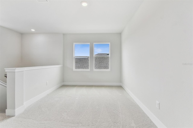 11884 Richmond Trl, Parrish, FL 34219 - spare room featuring carpet flooring and recessed lighting