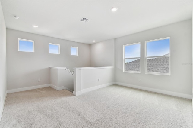 11884 Richmond Trl, Parrish, FL 34219 - unfurnished room with light carpet and recessed lighting