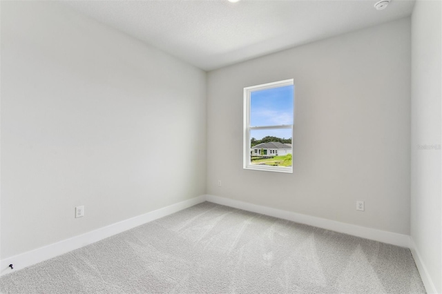 11884 Richmond Trl, Parrish, FL 34219 - carpeted spare room with baseboards