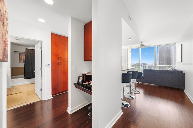 777 N Ashley Dr Unit 2610, Tampa, FL 33602 - hallway with dark wood-style flooring, baseboards, and visible vents