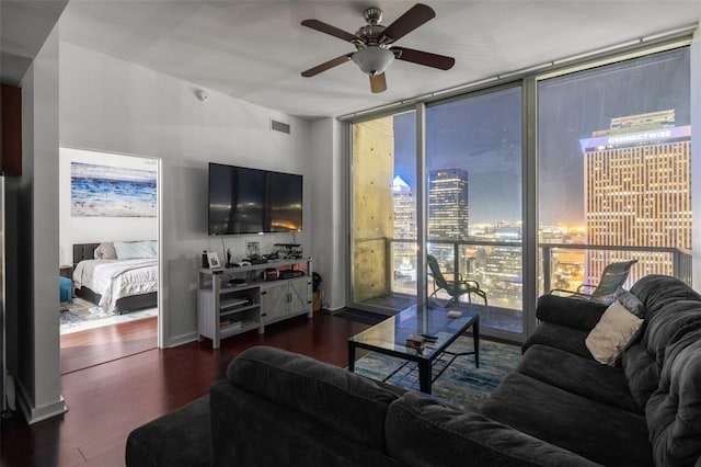 777 N Ashley Dr Unit 2610, Tampa, FL 33602 - living area with expansive windows, visible vents, wood finished floors, and ceiling fan
