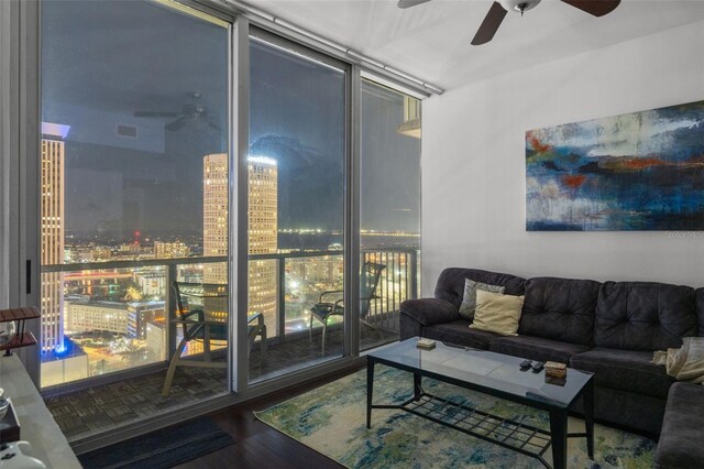 777 N Ashley Dr Unit 2610, Tampa, FL 33602 - living area with expansive windows, visible vents, a ceiling fan, a view of city, and wood finished floors