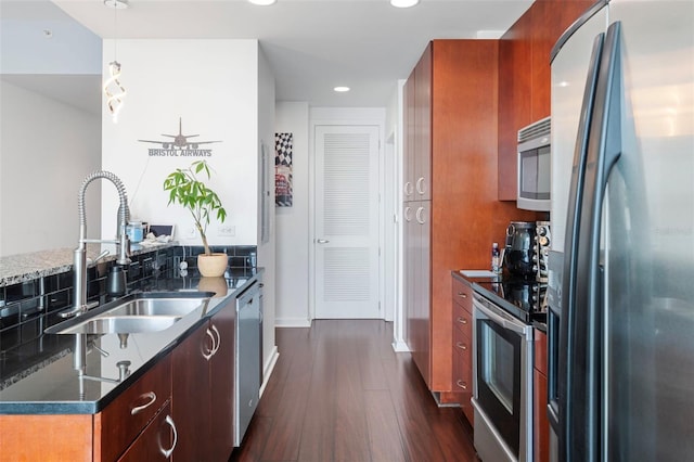777 N Ashley Dr Unit 2610, Tampa, FL 33602 - kitchen featuring modern cabinets, stainless steel appliances, recessed lighting, dark wood-type flooring, and a sink