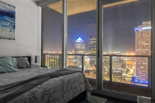 777 N Ashley Dr Unit 2610, Tampa, FL 33602 - bedroom featuring a view of city lights