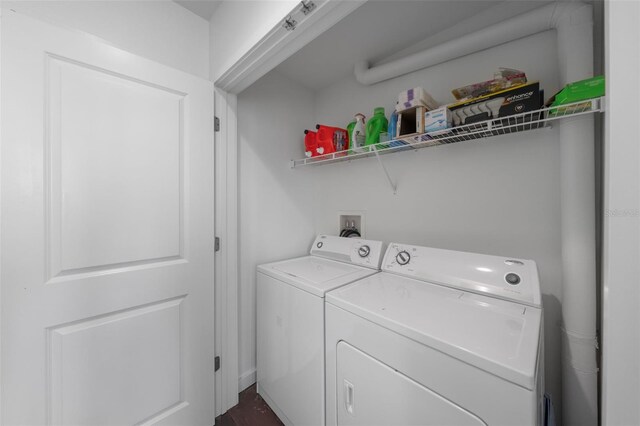 777 N Ashley Dr Unit 2610, Tampa, FL 33602 - clothes washing area with washer and clothes dryer and laundry area