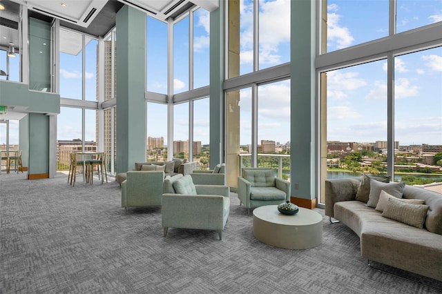 777 N Ashley Dr Unit 2610, Tampa, FL 33602 - carpeted living room featuring a city view and baseboards