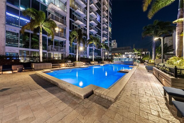 777 N Ashley Dr Unit 2610, Tampa, FL 33602 - pool at night featuring a community pool