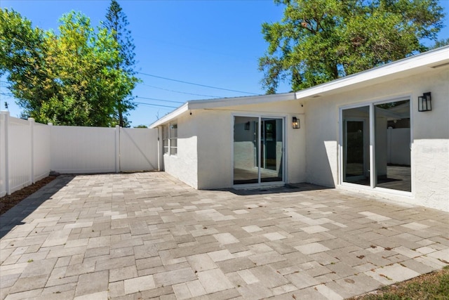 331 Barbara Cir, Belleair, FL 33756 - fenced backyard with a patio