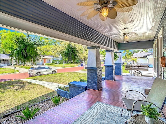 view of patio featuring covered porch and ceiling fan