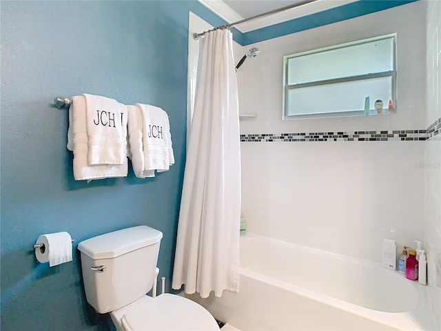full bathroom with toilet and shower / tub combo