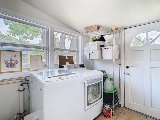 laundry room featuring independent washer and dryer, laundry area, and light tile patterned floors