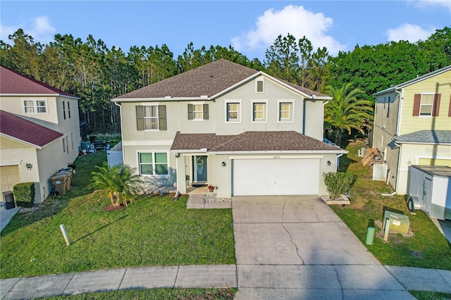 16755 Sunrise Vista Dr, Clermont, FL 34714 - traditional-style home featuring a garage, a front yard, driveway, and stucco siding