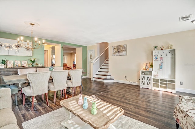 16755 Sunrise Vista Dr, Clermont, FL 34714 - living room with visible vents, a chandelier, baseboards, stairs, and wood finished floors