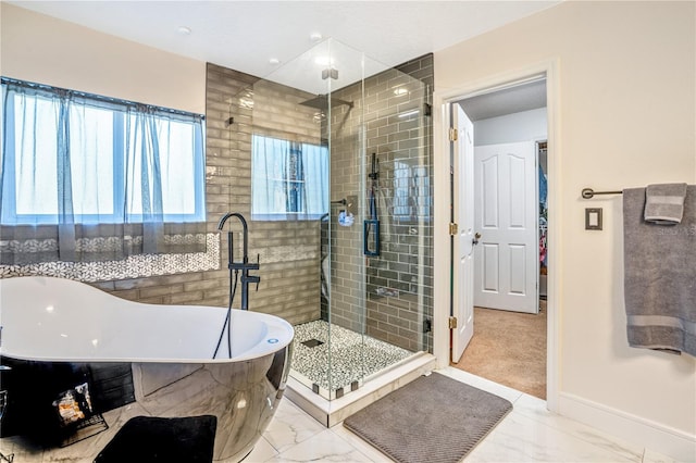 16755 Sunrise Vista Dr, Clermont, FL 34714 - full bathroom featuring a shower stall, baseboards, marble finish floor, and a freestanding bath